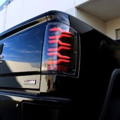 14-18 GMC Sierra 1500/2500HD/3500HD LUXX-Series LED Tail Lights Alpha-Black -Car Light Shop 14 18 gmc sierra 15002500hd3500hd luxx series led tail lights alpha black 524326