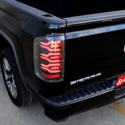 14-18 GMC Sierra 1500/2500HD/3500HD LUXX-Series LED Tail Lights Black-Red -Car Light Shop 14 18 gmc sierra 15002500hd3500hd luxx series led tail lights black red 919439